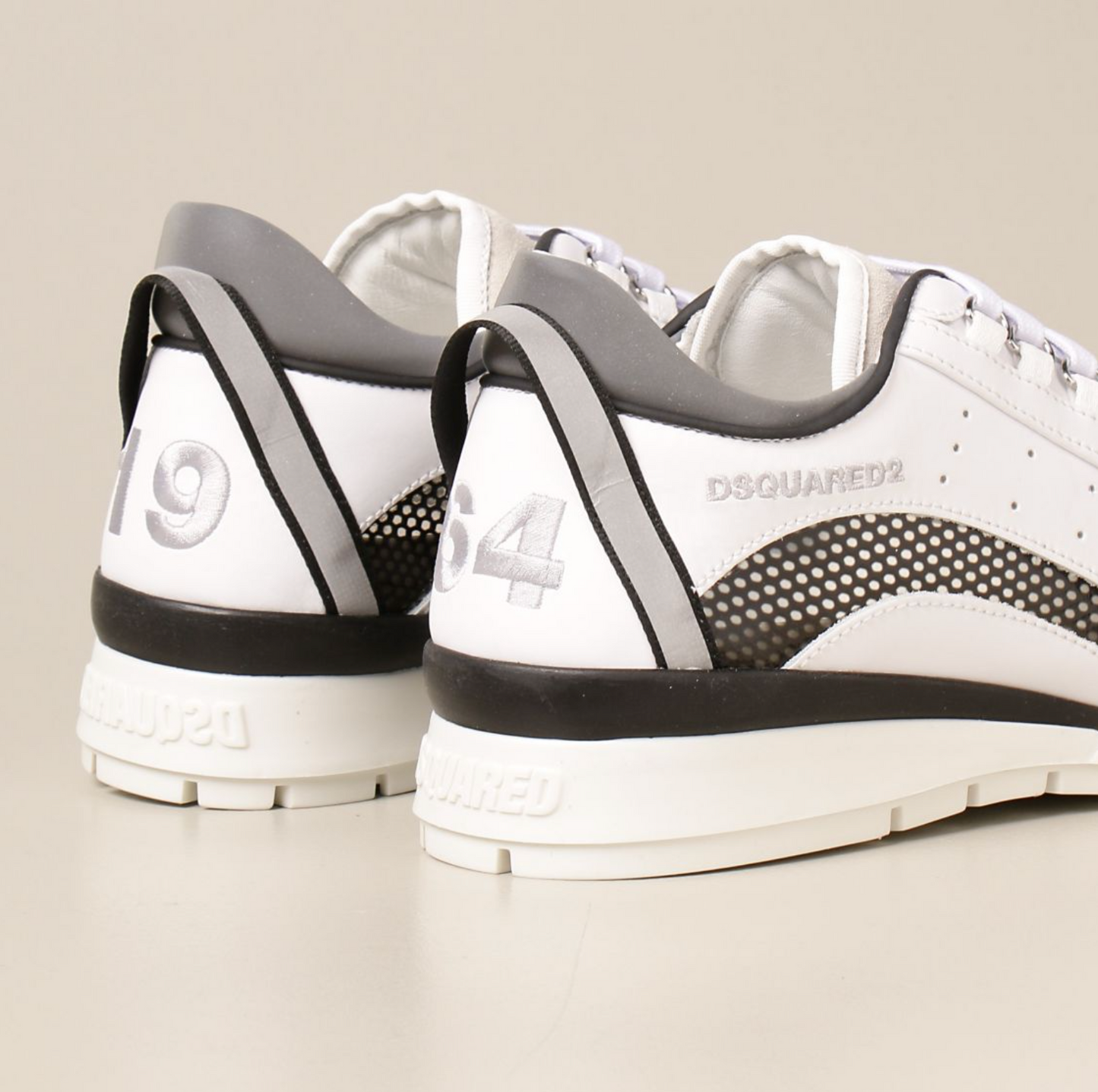 Dsquared² Sleek White Leather Sneakers with Metal Plaque