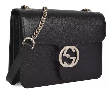 Gucci Elegant Black Leather Shoulder Bag with Silver Charm